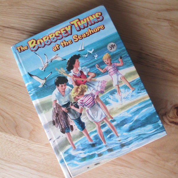 The Bobbsey Twins at The Seashore 1954 copyright in hardcover in very nice condition for young readers and collectors by Laura Lee Hope