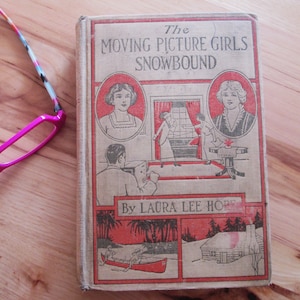 Antique book 1914 The Moving Picture Girls Snowbound hardcover in very nice condition to read and collect by Laura Lee Hope