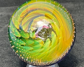 Fumed Implosion Over Air-Trap Vortex with Encased Silicon Chunk