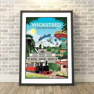 May include: A colorful illustration of a vintage amusement park called "Wicksteed" in Northamptonshire. The illustration features a roller coaster, a carousel, a train, and a building with a clock tower.