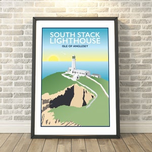 May include: A colorful illustration of South Stack Lighthouse on the Isle of Anglesey. The lighthouse is white with a black top and is situated on a green cliff with a large rock formation. The sky is blue with a yellow sun.