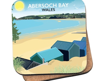 May include: A colorful illustration of beach huts on a sandy beach with a blue ocean and a yellow sun in the sky. The text "ABERSOCH BAY WALES" is printed on the image.