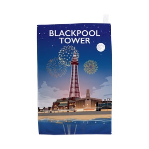 May include: A rectangular tea towel featuring a graphic illustration of the Blackpool Tower at night. The design includes golden fireworks, a full moon, and a starry dark blue sky above the illuminated coastal buildings and their water reflection.
