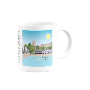 May include: White ceramic mug with a colorful illustration of Putney Bridge, the home of the Boat Race since 1829. The illustration shows the bridge, the river Thames, and rowers in a boat.