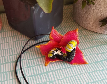 SALE Caterpillar and hibiscus flower necklace