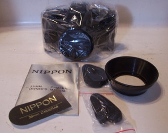 New Vintage NIPPON 35mm Camera AR-4392F w/Case Strap Sun Shade Lens Cap,  As Seen On TV 1990's In original shipping box,