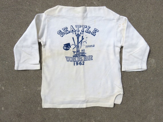 XS S 1962 Seattle Worlds Fair Cotton Sweatshirt 60s Sweatshirt, Boatneck, White With Blue Flock Print Pullover, Youth Large 1960s 50s 1950s - Etsy Canada XS S 1962 Seattle Worlds Fair Cotton Sweatshirt 60s Sweatshirt, Boatneck, White With Blue Flock Print Pullover, Youth Large 1960s 50s 1950s - Etsy Canada