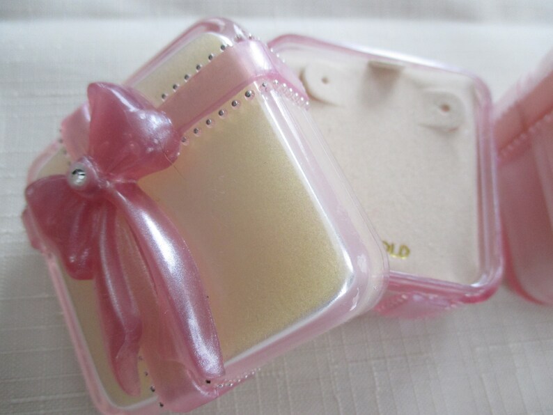Vintage Pretty Pink ribbon and rhinestone acrylic jewelry trinket ring earring box by J pink jewelry box C ribbon and rhinestone box M.