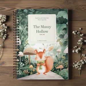 May include: A spiral-bound notebook titled The Mossy Hollow Year One by Whimsy Printables, featuring a cover illustration of a squirrel in a green scarf standing on a path in a forest with various mushrooms and green foliage.