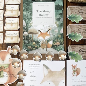 May include: A Woodland Writers educational set titled The Mossy Hollow, featuring a clipboard with a fox illustration, word review worksheets, and various cut-out shapes including mushrooms, leaves, and envelopes with printed vocabulary words.