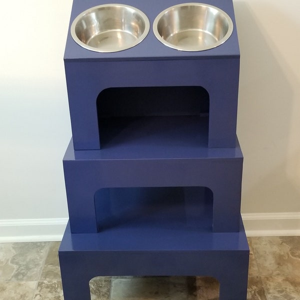 Elevated feeding table for Dogs, can make for cats too.