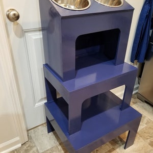 Elevated feeding table for Dogs, can make for cats too.