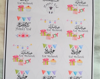 May include: A sheet of 10 round stickers with colorful watercolor designs celebrating Eid. The stickers feature Arabic calligraphy, gifts, cupcakes, and a sheep. The text on the stickers reads "Eid Mubarak" and "Happy Eid".