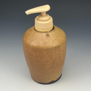 Wheel thrown soap dispenser