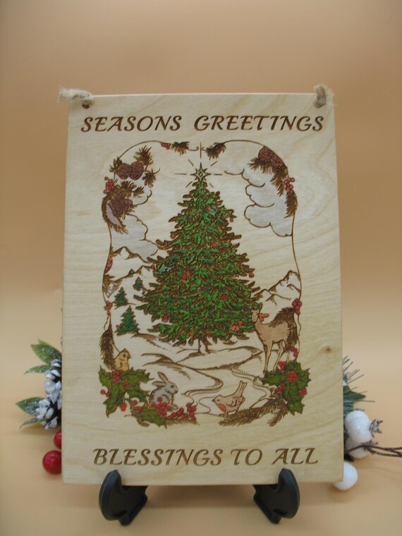 Handmade wooden seasons greetings festive wall decor