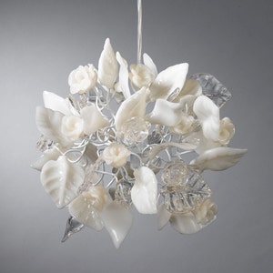 kitchen pendant lighting with clear and white flowers and leaves. image 1