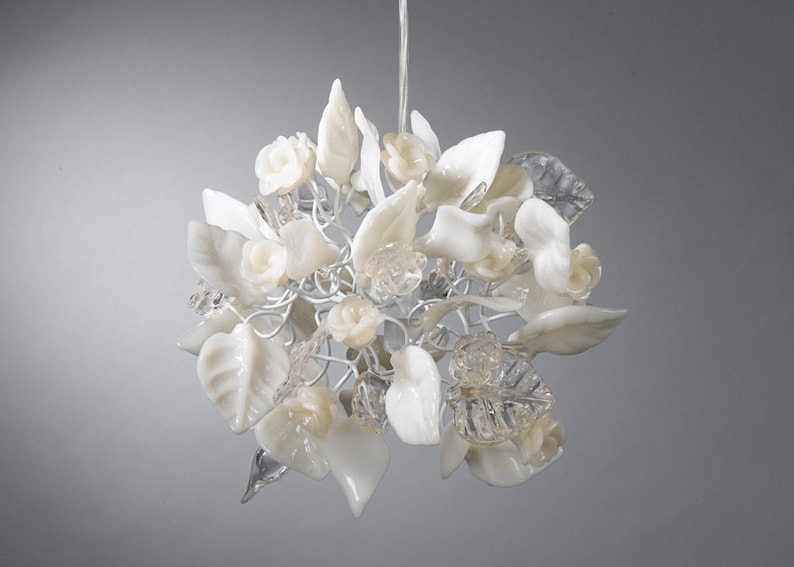 kitchen pendant lighting with clear and white flowers and leaves. image 1