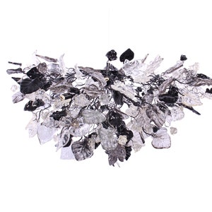 Elegant chandelier lighting with fray, black and clear color flowers & leaves for Dining Room