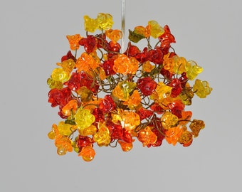 Pendant lighting, kitchen island lighting with warm color roses flowers.