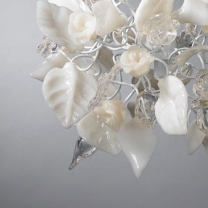 kitchen pendant lighting with clear and white flowers and leaves. image 3