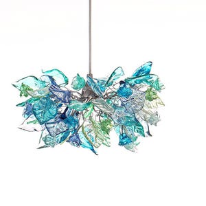 Pendant Lighting for kitchen island with sea color flowers and leaves.