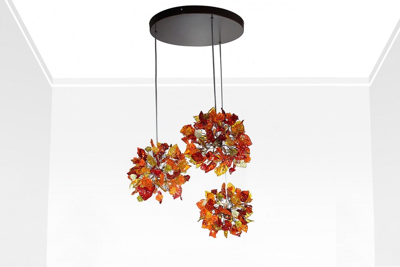 Triple Round Pendant Light With Autumn Colored Resin Leaves image 1