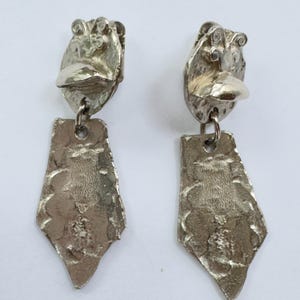 vintage Boucles d'oreilles clip pendantes en argent texturé Kenneth Lane, bijoux modernistes KJL