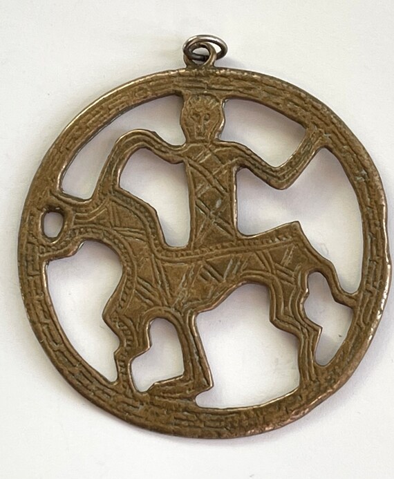 Metropolitan Museum of Art Pendant,  Man Riding Ho