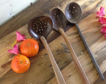 Eco-friendly wooden strainer cooking spoons. Hand made from coconut shell and native sustainable Sri Lankan Mara timber. Serving Spoons.