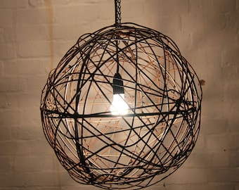 Fence Wire Ball Light fittings / Lamp Shades with shadow effect. Made in Australia from recycled rusted wire.