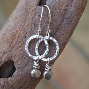 Argentium silver hoop earrings, dangle drop earrings, Argentium silver, pebble drop and hammered silver hoop handmade by arcjewellery UK