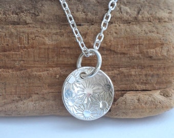 Silver daisy pendant necklace, flower jewellery, hand stamped silver charm necklace, daisy design, handmade by arc jewellery UK