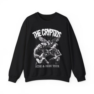 May include: Black sweatshirt with a white graphic of a band of cryptids playing instruments. The band includes a gorilla, a skeleton, and a moth playing drums. The text "THE CRYPTIDS" is above the band, and "HIDE & SEEK TOUR" is below.