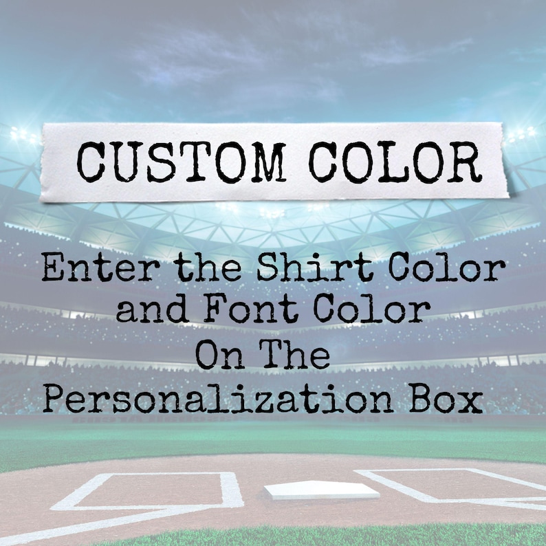 May include: Image with text that reads "CUSTOM COLOR". Below the text, it says "Enter the Shirt Color and Font Color On The Personalization Box". The background is a baseball field.