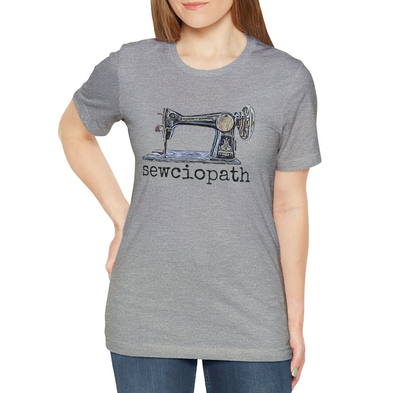 May include: A heather gray t-shirt with a vintage sewing machine graphic and the text "sewcioptah" printed on the front.