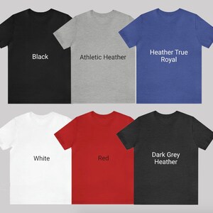 May include: Six different color t-shirts, including black, athletic heather, heather true royal, white, red, and dark grey heather.