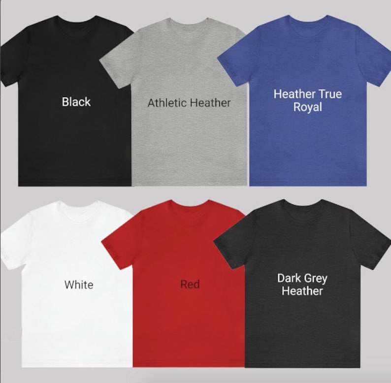 May include: Six different color t-shirts, including black, athletic heather, heather true royal, white, red, and dark grey heather.