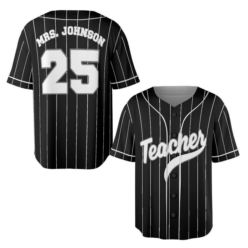 May include: Black and white baseball jersey with vertical pinstripes. The back of the jersey has the name "MRS. JOHNSON" above the number "25" in white. The front of the jersey says "Teacher" in white script.