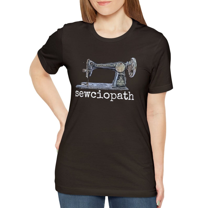 May include: A black t-shirt with a vintage sewing machine graphic and the text "sewciophat" in white.