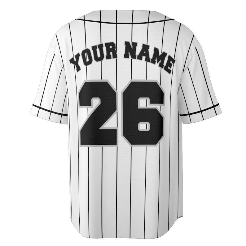 May include: White baseball jersey with black pinstripes, short sleeves, and a button-up front. The back features the text "YOUR NAME" above the number "26" in black with a gray outline.