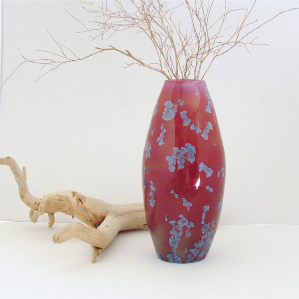 Red  ceramic vase with blue crystals