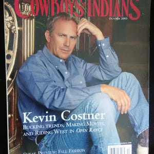 May include: A magazine cover featuring actor Kevin Costner. The magazine title "Cowboys & Indians" is in large red letters. The cover also includes text that reads "Special Western Lifestyle Issue" and "October 2003."