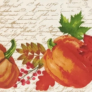 May include: A vintage-style illustration featuring a variety of autumnal fruits and vegetables, including a pumpkin, pomegranate, apples, and grapes. The background is a cream-colored fabric with handwritten text.