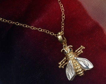 Bee Necklace in Solid Gold with Black Diamonds.