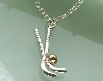 Hockeyschläger Anhänger aus Sterling Silber und 750 Gold.