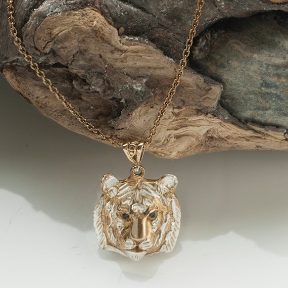 String necklace, metal pendant, tiger head