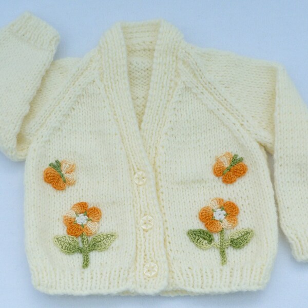 Baby sweater. Baby girl hand knitted cream cardigan to fit 0 to 3 months