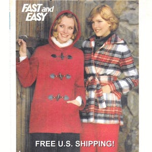 May include: A vintage sewing pattern cover showing two women in coats. One wears a red hooded duffel coat with toggle fastenings. The other wears a red, black, and white plaid coat with a belt. The text "FAST and EASY" is at the top.