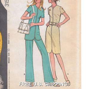 May include: A vintage sewing pattern envelope illustration featuring two outfits: a teal short-sleeved tunic with matching wide-leg trousers and a beige short-sleeved dress with a belted waist. The text 315, MISSES' SIZE 10, and BUST 32 1/2 are visible.