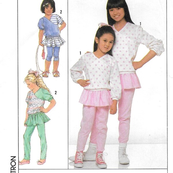 A Stretch Knit Pants with Attached Skirt & V-Neck Top Sewing Pattern for Children: Uncut - Sizes S-M-L (3-4-5-6-6x) • Simplicity 9272